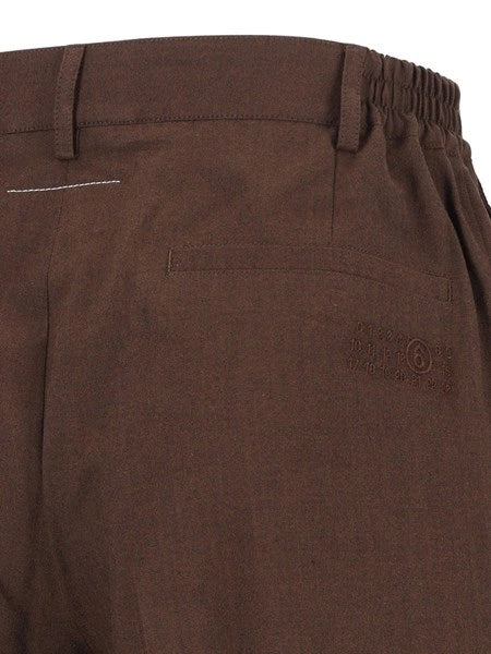 Pantaloni a gamba larga con pinces