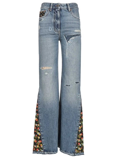 Jeans flare con inserti