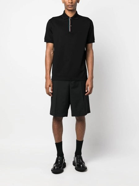 Polo con rifiniture a righe