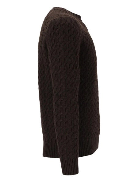 Maglione a trecce