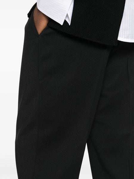 Pantaloni con pieghe