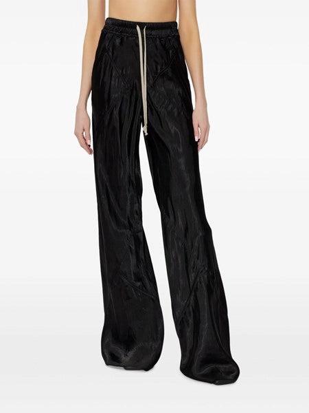 Pantaloni larghi con finitura lucida