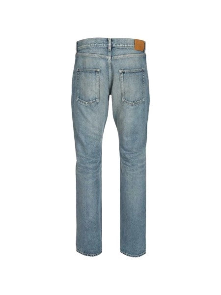jeans slim rilassati a vita bassa in denim blu