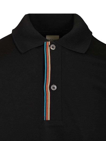 Polo con rifiniture a righe