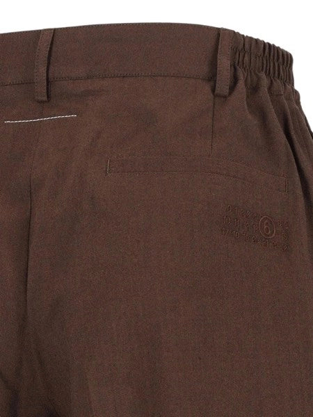 Pantaloni a gamba larga con pinces