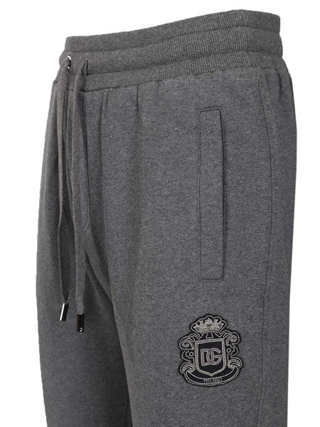 Pantaloni in jersey con patch araldico