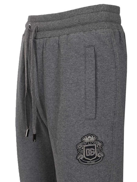 Pantaloni in jersey con patch araldico