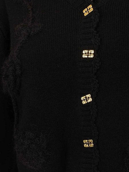 Cardigan nero con applicazioni all'uncinetto