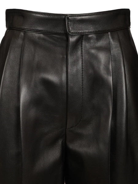 Pantaloni in pelle lucida