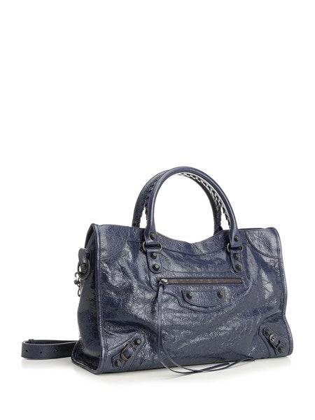 Borsa "Le City" Media