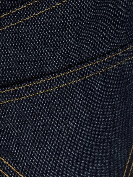 Jeans con tasca intrecciata