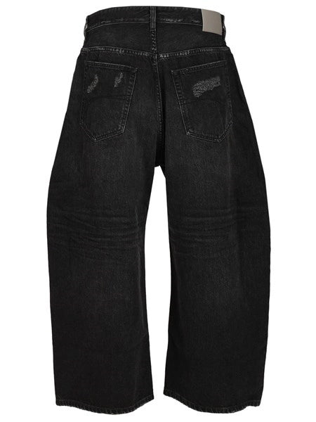 Jeans incurvati