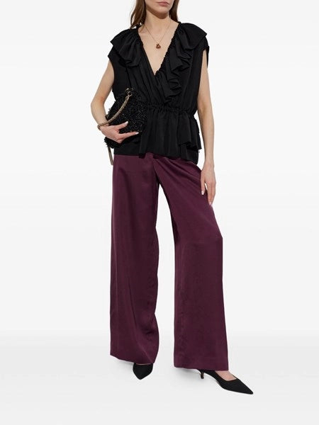 Top in jersey con cintura