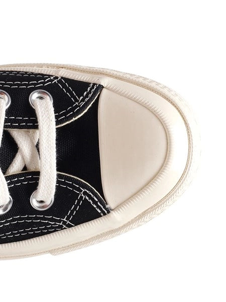 Converse low-top con cuore rosso