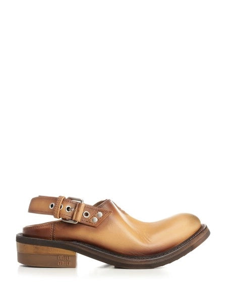 Mules in pelle