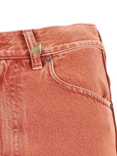 Jeans a vita alta e gamba dritta