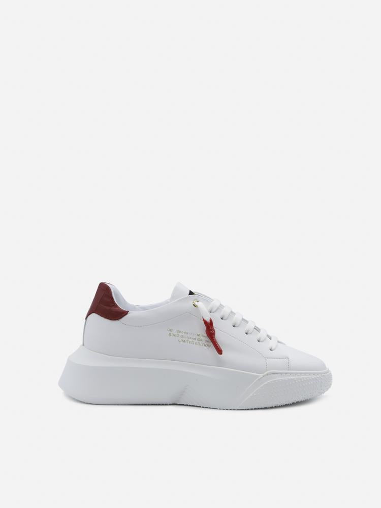 Sneakers nemesis in pelle con talloncino a contrasto