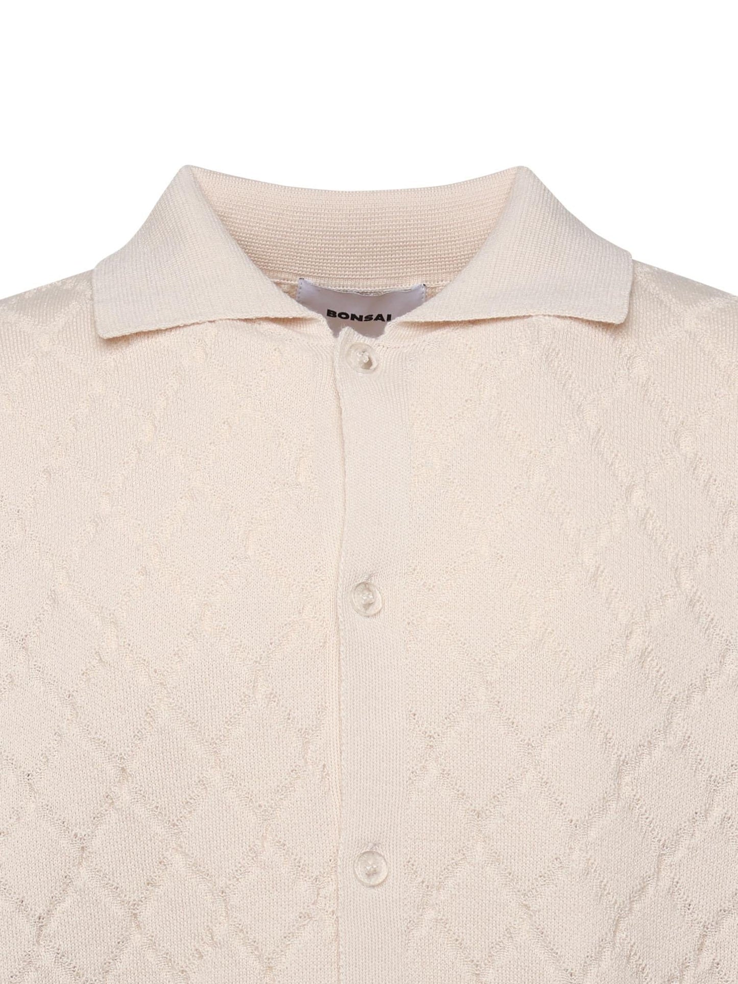 Polo a rombi in maglia