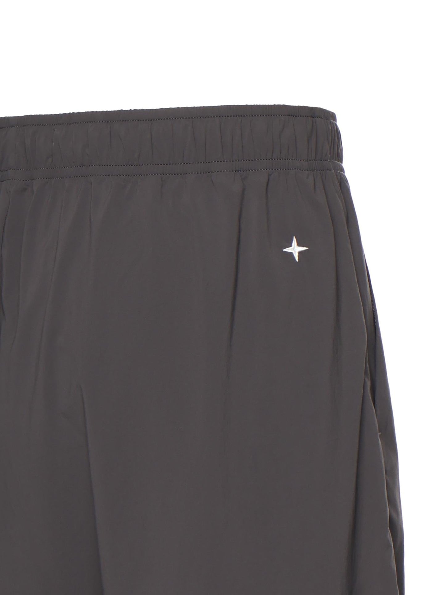 Shorts tecnici a gamba larga