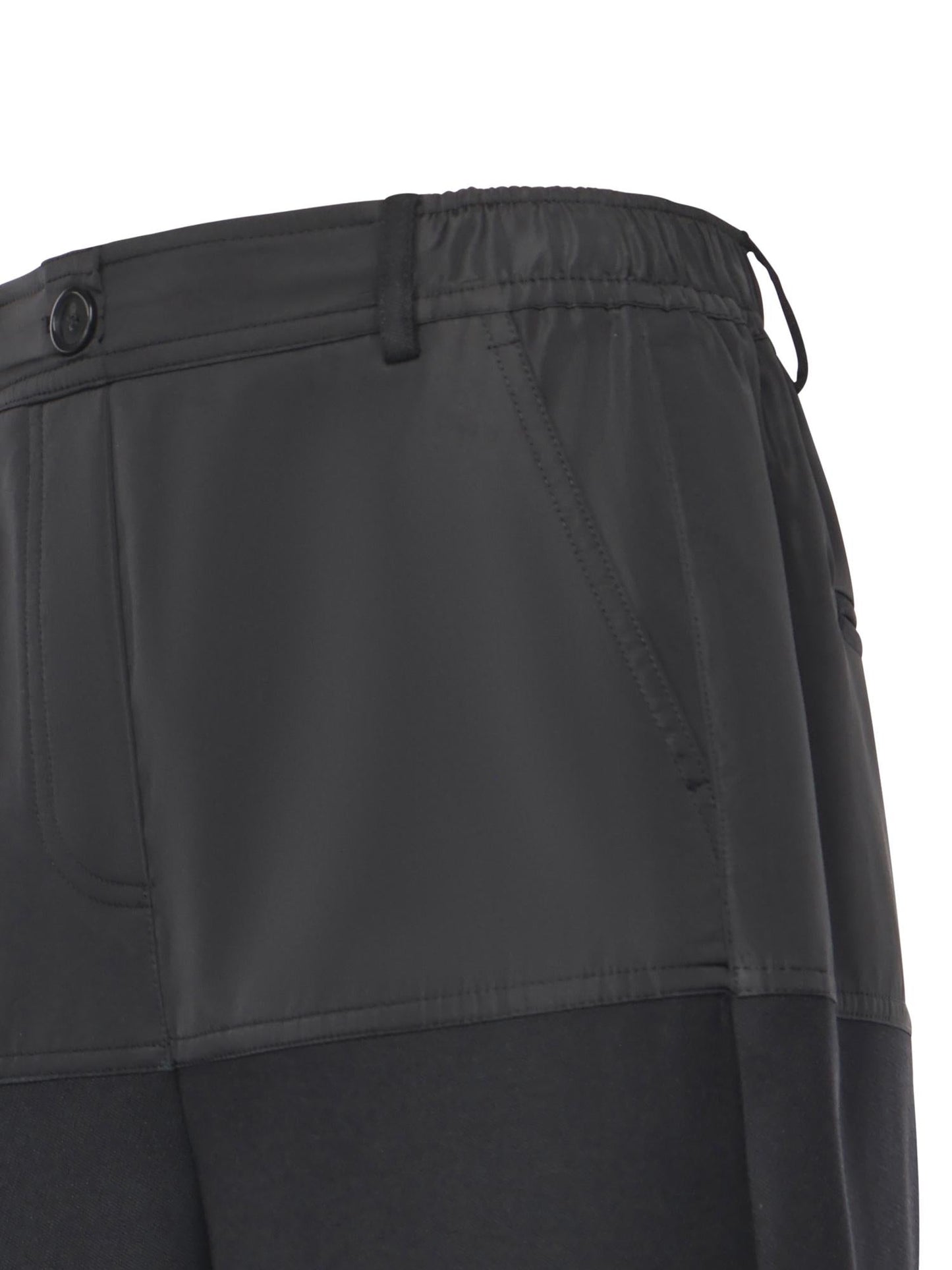 Pantaloni con doppio tessuto