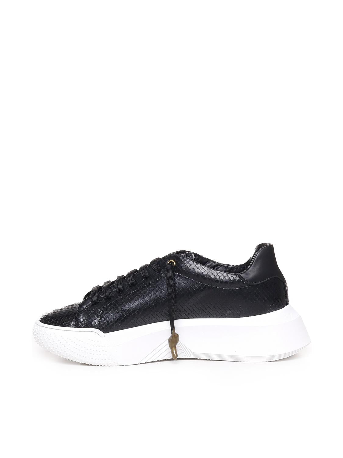 Sneakers Nemesis in nappa con stampa pitone