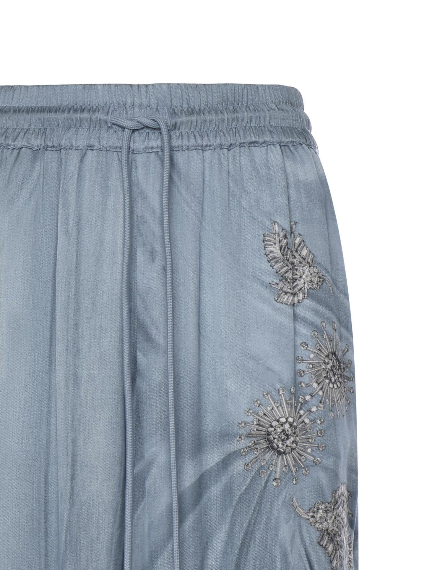 Pantaloni fluidi con stampa gioiello