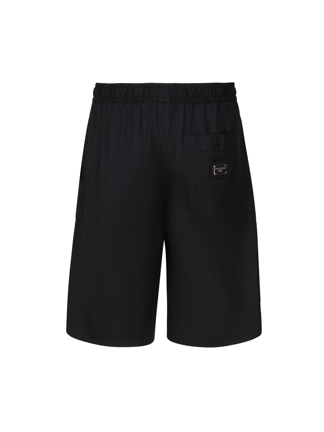 Bermuda jogging in cotone con placca logata