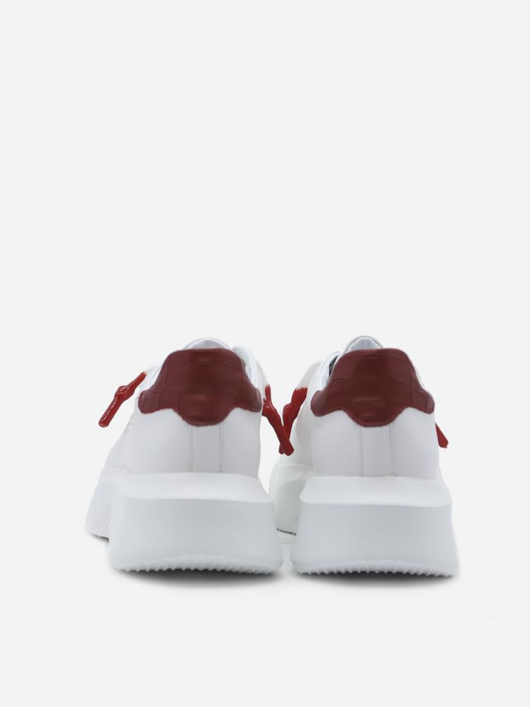 Sneakers nemesis in pelle con talloncino a contrasto