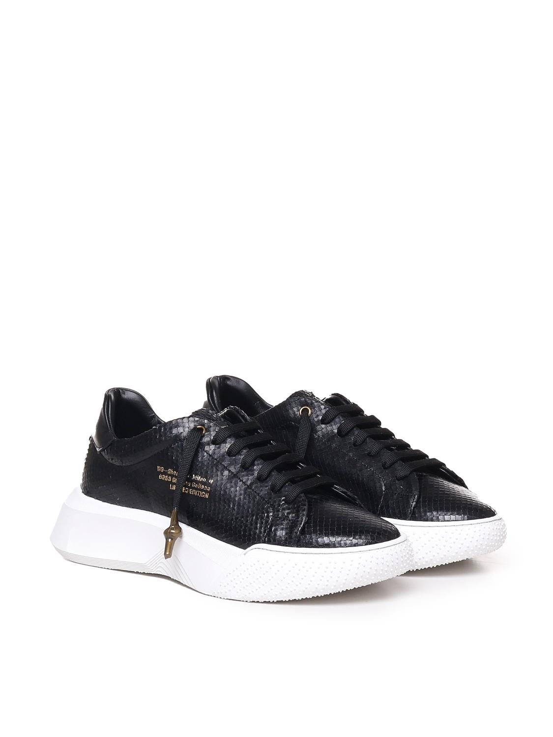 Sneakers Nemesis in nappa con stampa pitone
