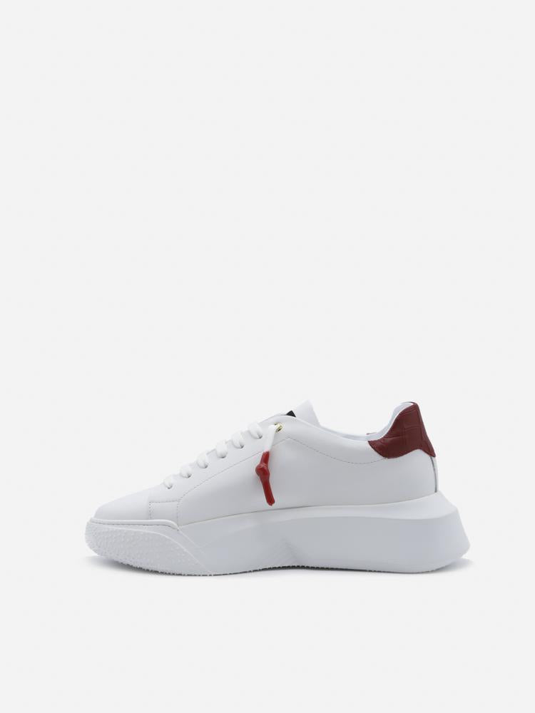 Sneakers nemesis in pelle con talloncino a contrasto