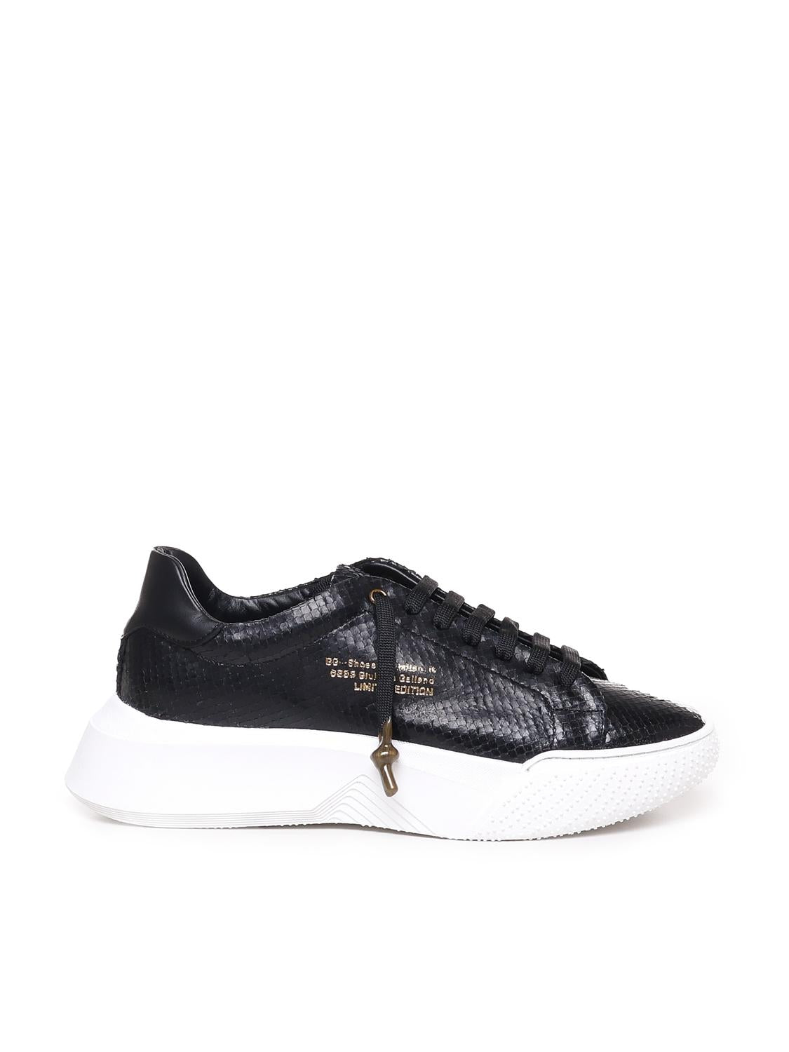 Sneakers Nemesis in nappa con stampa pitone