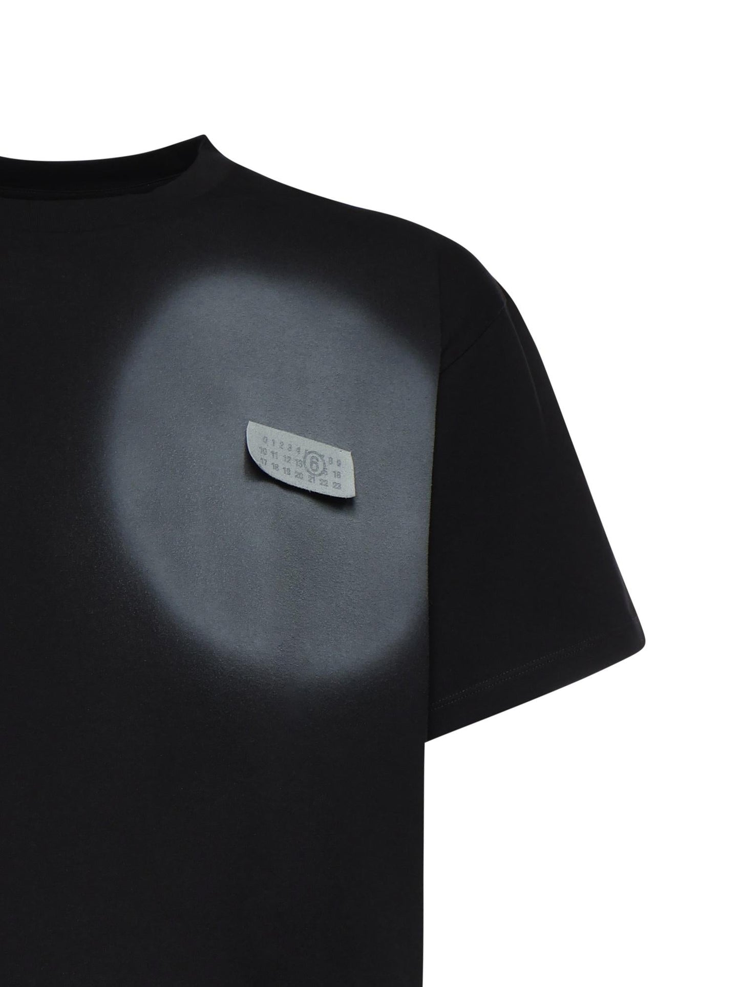 T-shirt con stampa spray in cotone