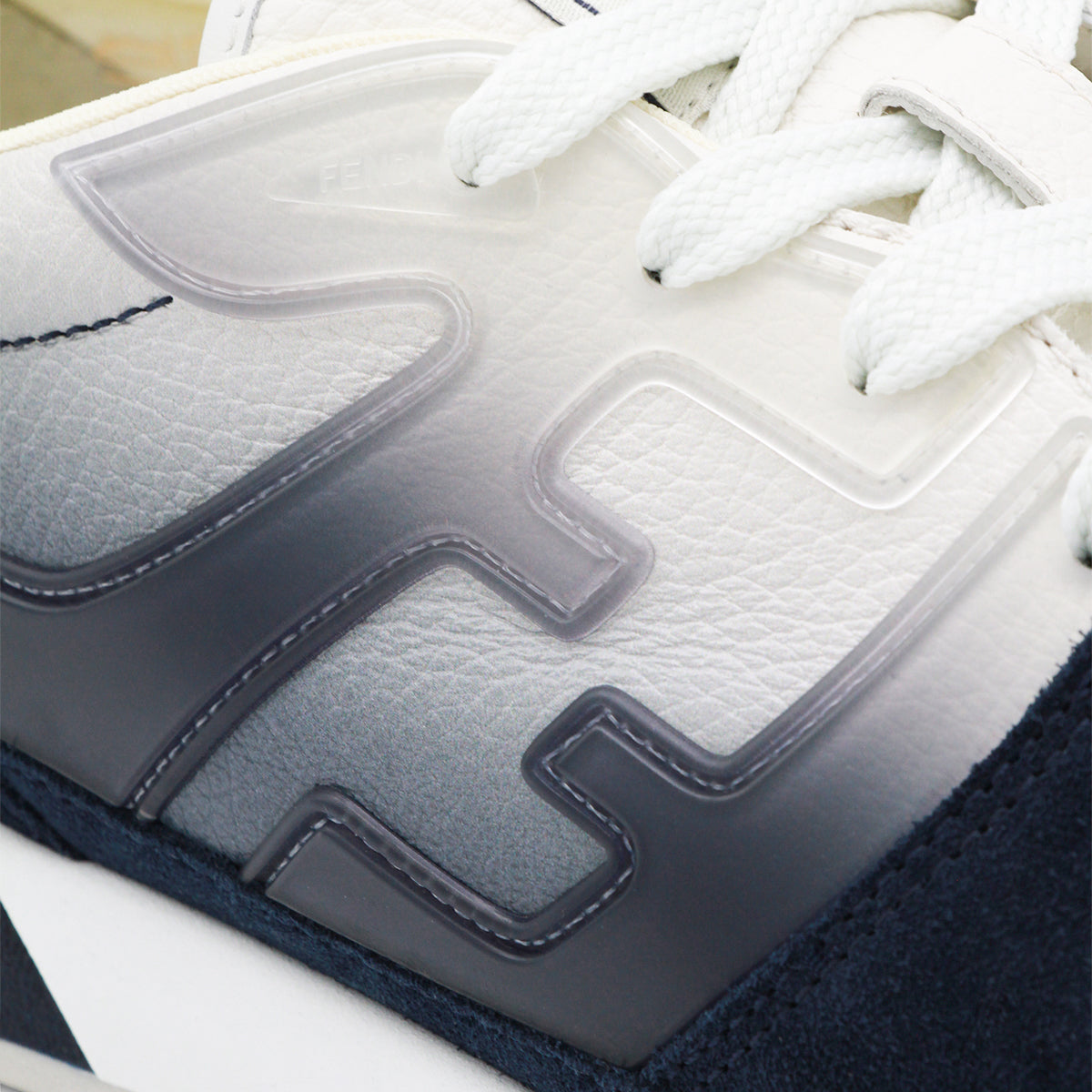 NAVY AND WHITE LEATHER SNEAKERS