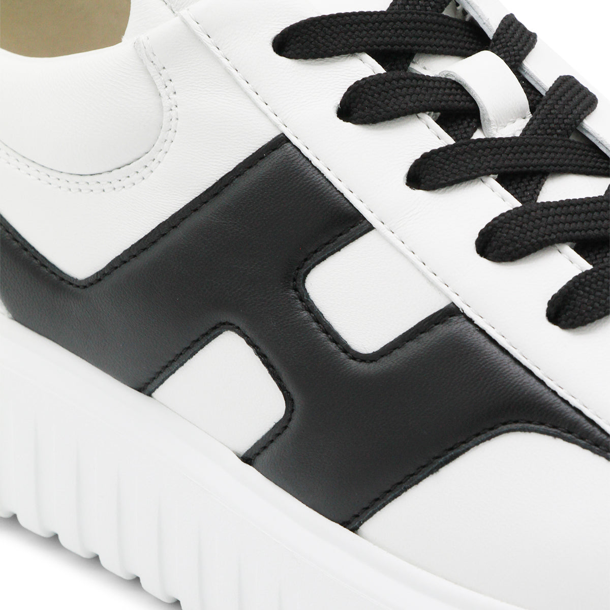 WHITE AND BLACK LEATHER SNEAKERS